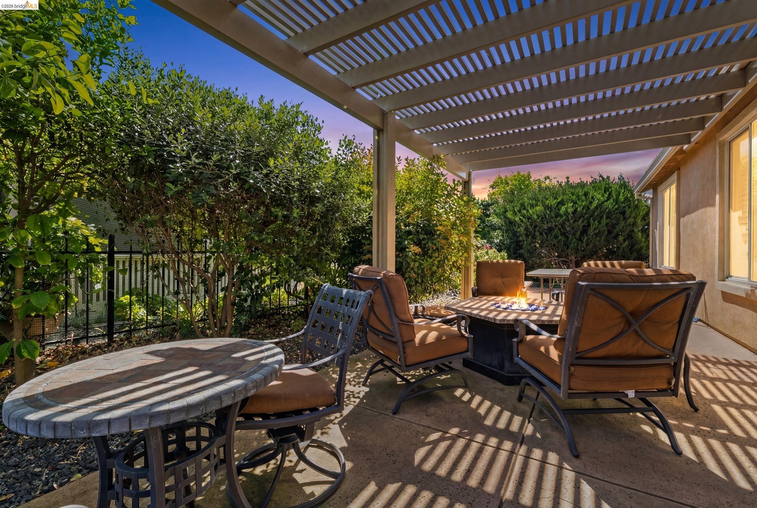 1063 Waterwood Drive Rio Vista, CA 94571 - Photo 34 of 38 a view of a patio with table and chairs and wooden floor