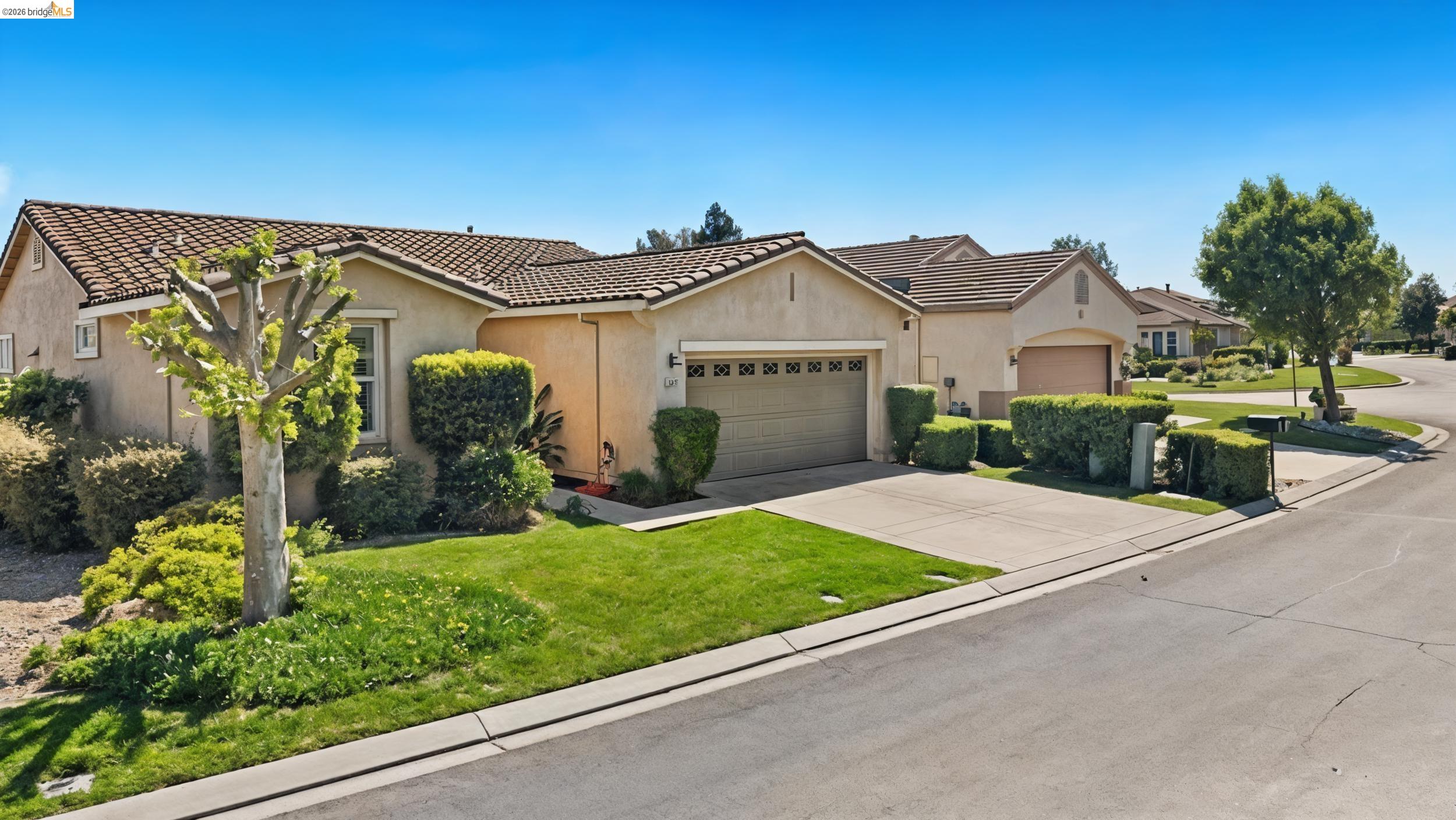 1063 Waterwood Drive Rio Vista, CA 94571 - Photo 4 of 38 a front view of a house with garden