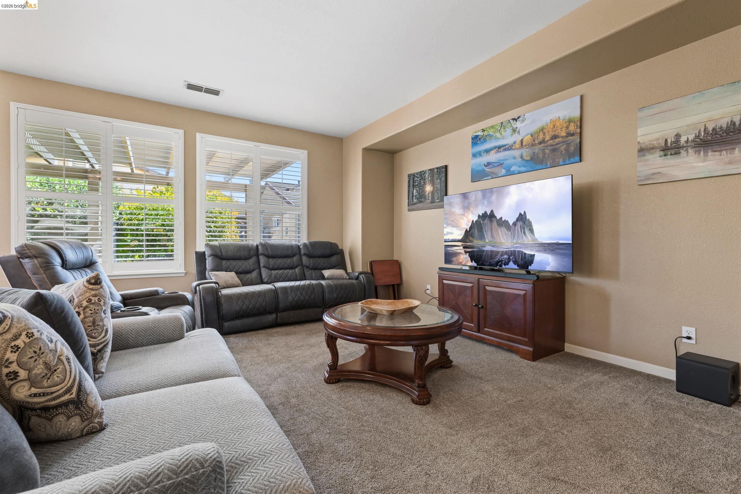 1063 Waterwood Drive Rio Vista, CA 94571 - Photo 9 of 38 a living room with furniture and a large window
