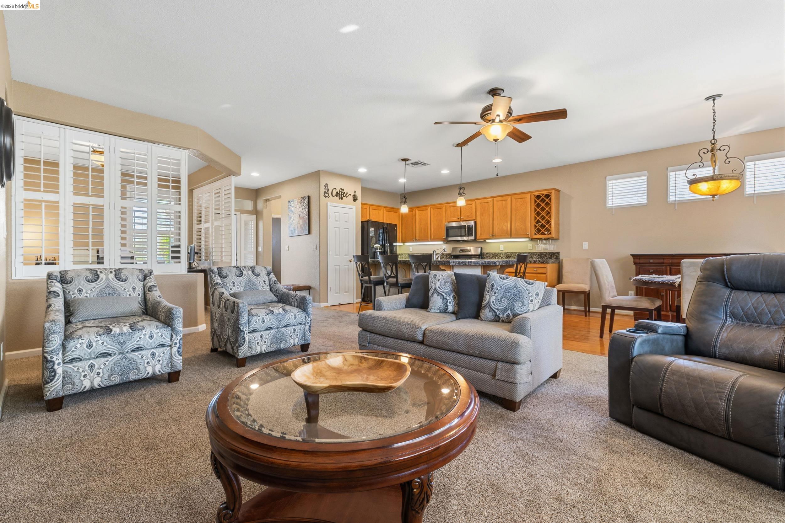 1063 Waterwood Drive Rio Vista, CA 94571 - Photo 10 of 38 a living room with furniture and a chandelier