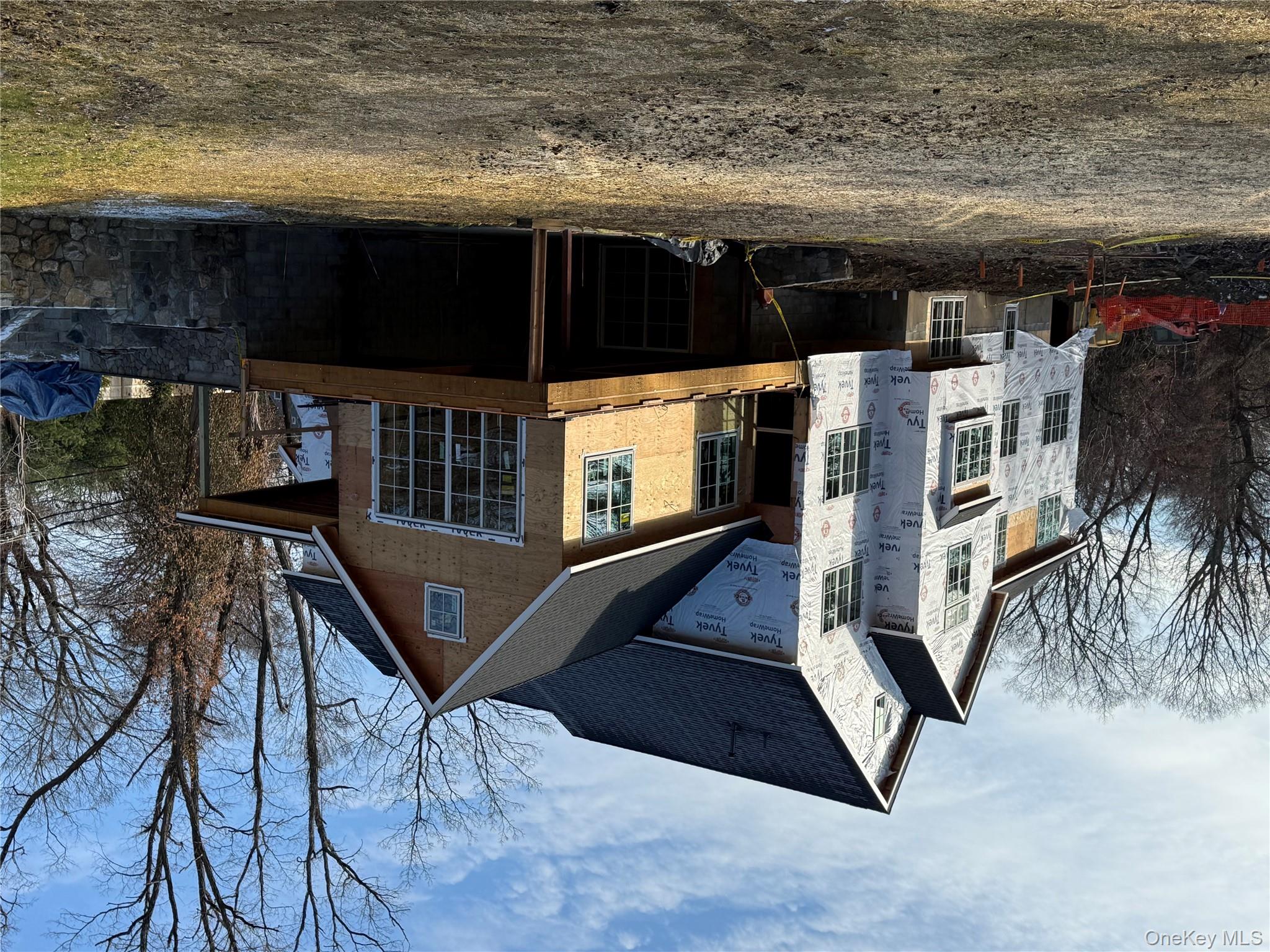 211 Bedford Road Chappaqua, NY 10514 - Photo 4 of 21 a front view of a house with a yard