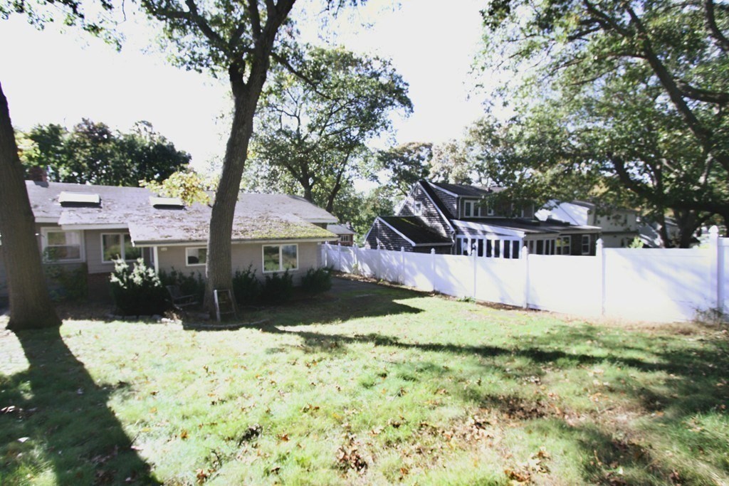 311 Ridge Street Arlington, MA 02474 - Photo 13 of 15 a view of a house with a yard
