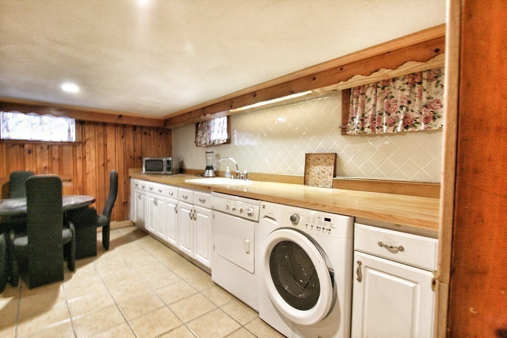 311 Ridge Street Arlington, MA 02474 - Photo 9 of 15 a utility room with dryer and washer