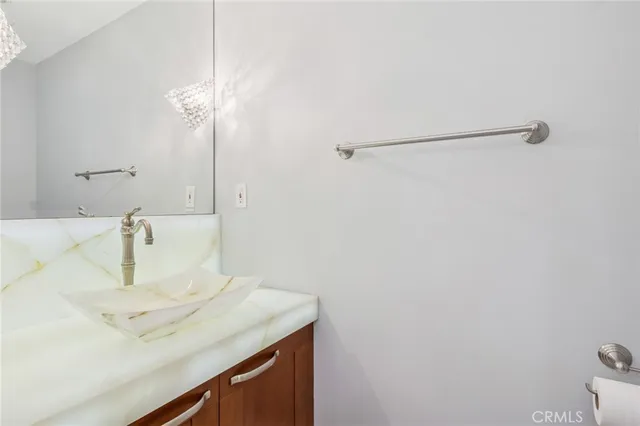 a bathroom with a sink and a vanity