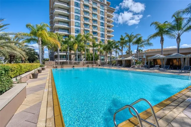a view of a swimming pool with a patio