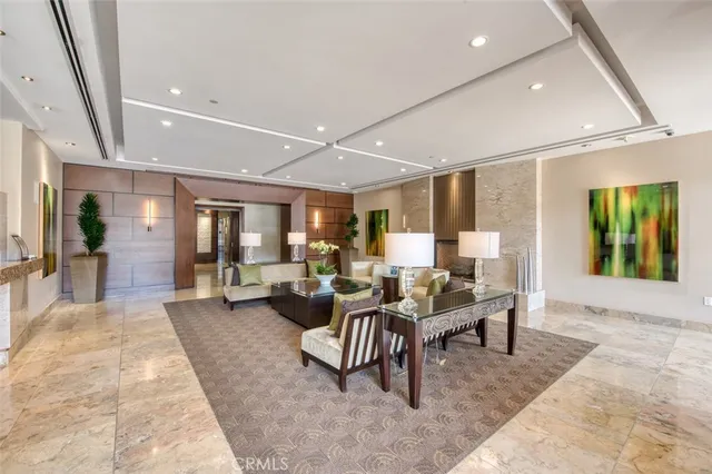 a living room with furniture a rug and a large window