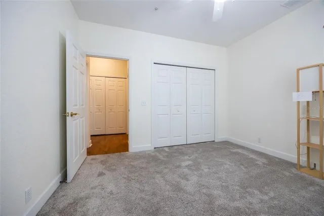 an empty room with a bathroom