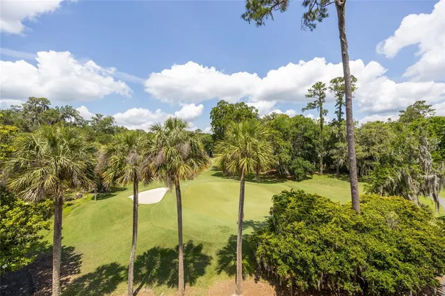 a view of a garden from a balcony
