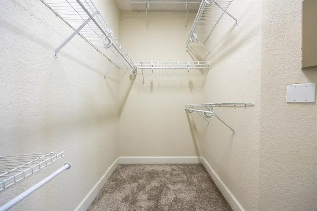 a bathroom with a granite countertop sink mirror and double
