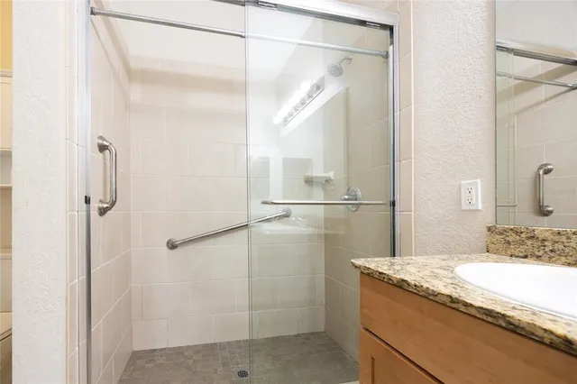 a view of a hallway with washer and dryer