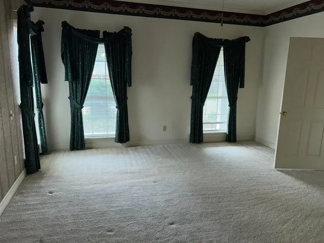 a view of a closet with storage