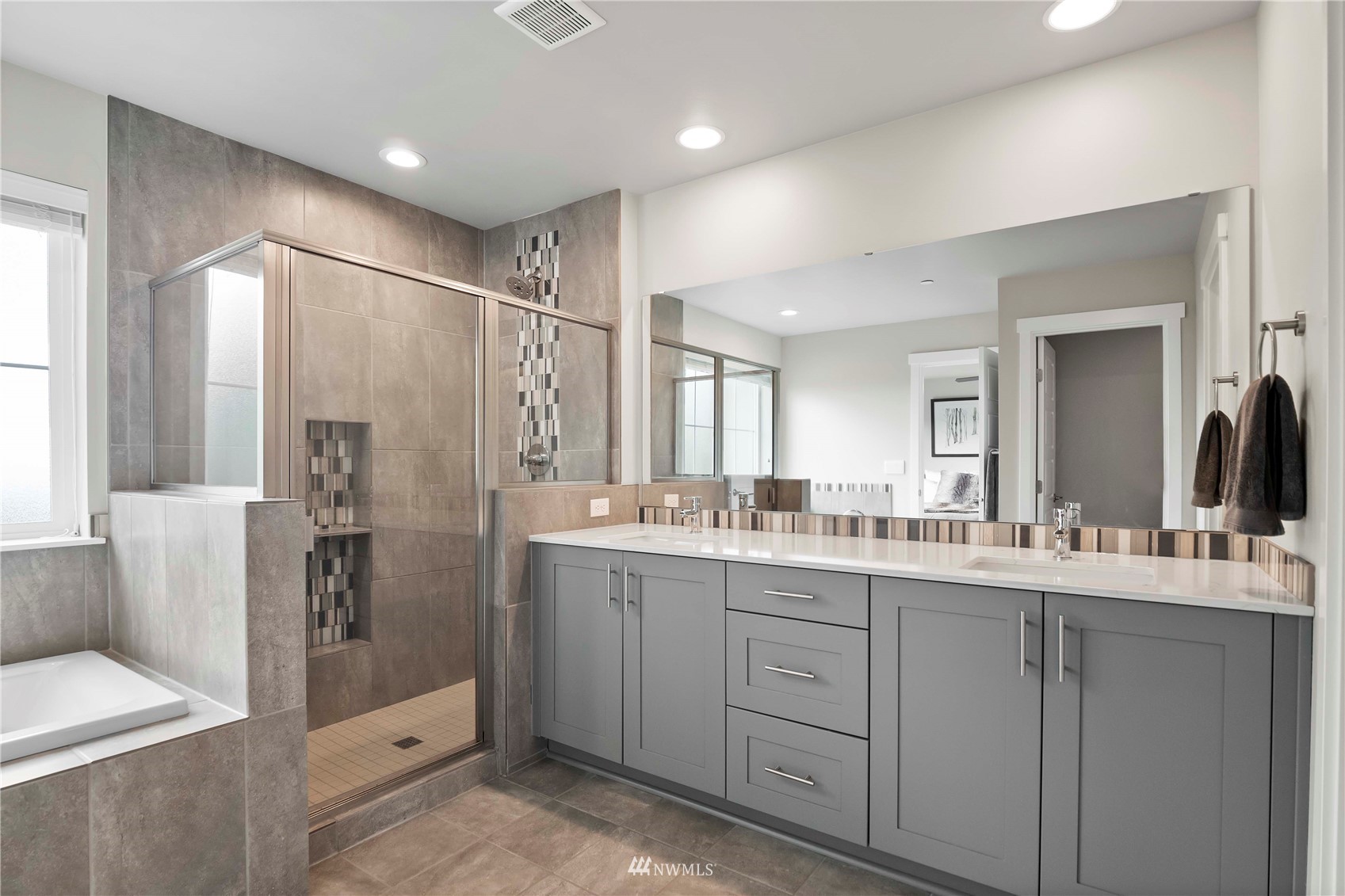 1325 Seattle Hill Road, Unit C4 Bothell, WA 98012 - Photo 13 of 33 a bathroom with a double vanity sink mirror and double