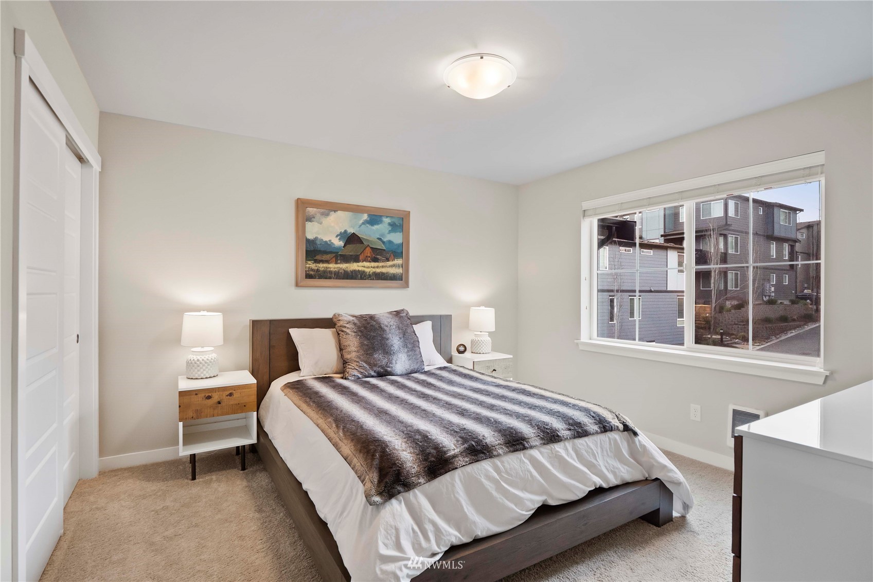 1325 Seattle Hill Road, Unit C4 Bothell, WA 98012 - Photo 16 of 33 a bedroom with a large bed and a window