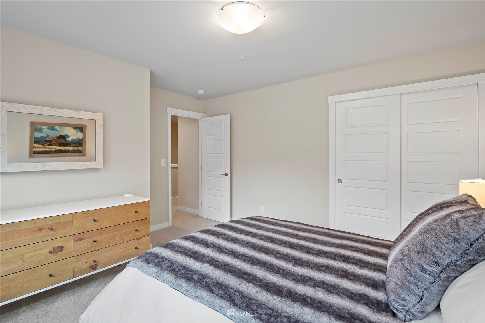 1325 Seattle Hill Road, Unit C4 Bothell, WA 98012 - Photo 17 of 33 a bedroom with a bed and a dresser