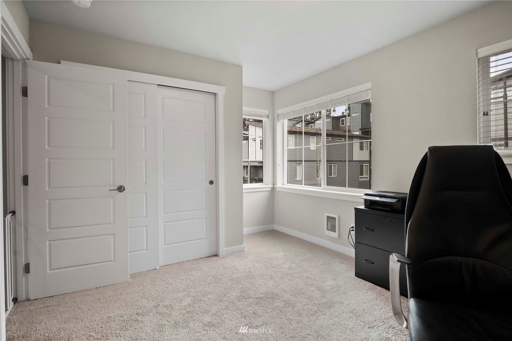 1325 Seattle Hill Road, Unit C4 Bothell, WA 98012 - Photo 19 of 33 a view of a bedroom with furniture and windows