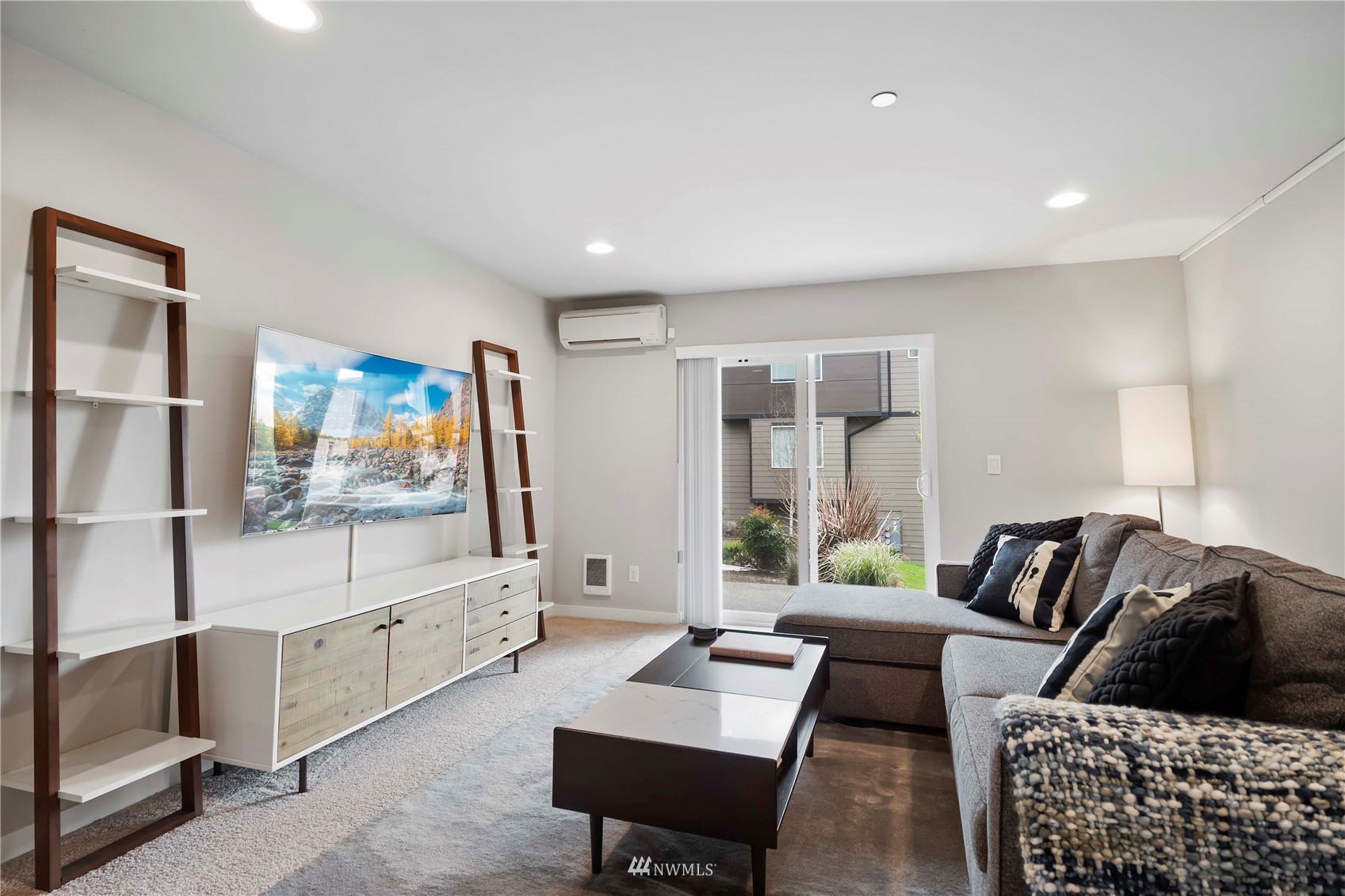1325 Seattle Hill Road, Unit C4 Bothell, WA 98012 - Photo 22 of 33 a living room with furniture and a flat screen tv