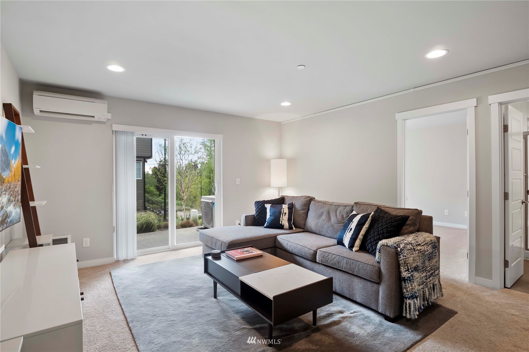 1325 Seattle Hill Road, Unit C4 Bothell, WA 98012 - Photo 24 of 33 a living room with furniture and a flat screen tv