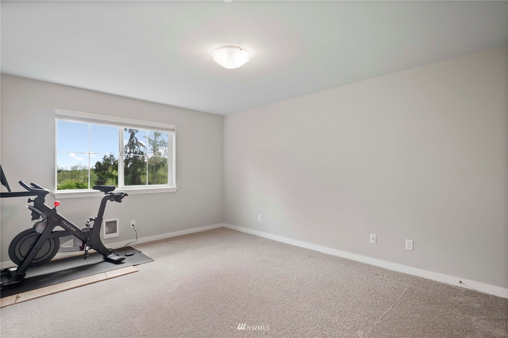 1325 Seattle Hill Road, Unit C4 Bothell, WA 98012 - Photo 26 of 33 a view of room with gym equipment and floor to ceiling window