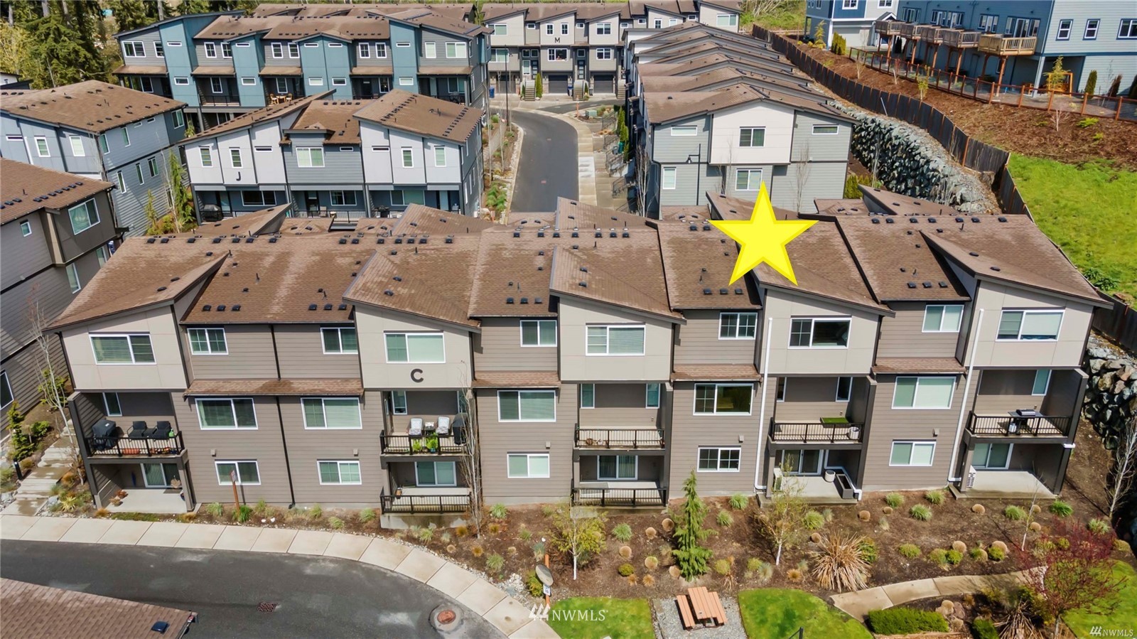 1325 Seattle Hill Road, Unit C4 Bothell, WA 98012 - Photo 29 of 33 a front view of a residential apartment building with a yard