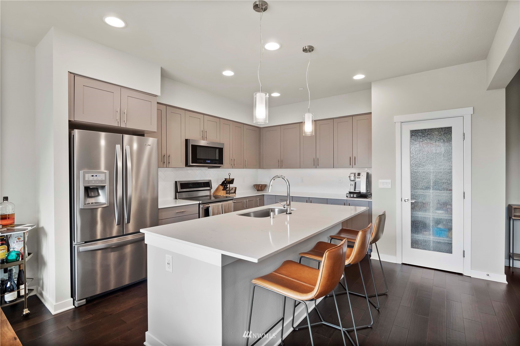 1325 Seattle Hill Road, Unit C4 Bothell, WA 98012 - Photo 5 of 33 a kitchen with stainless steel appliances a refrigerator and a stove top oven