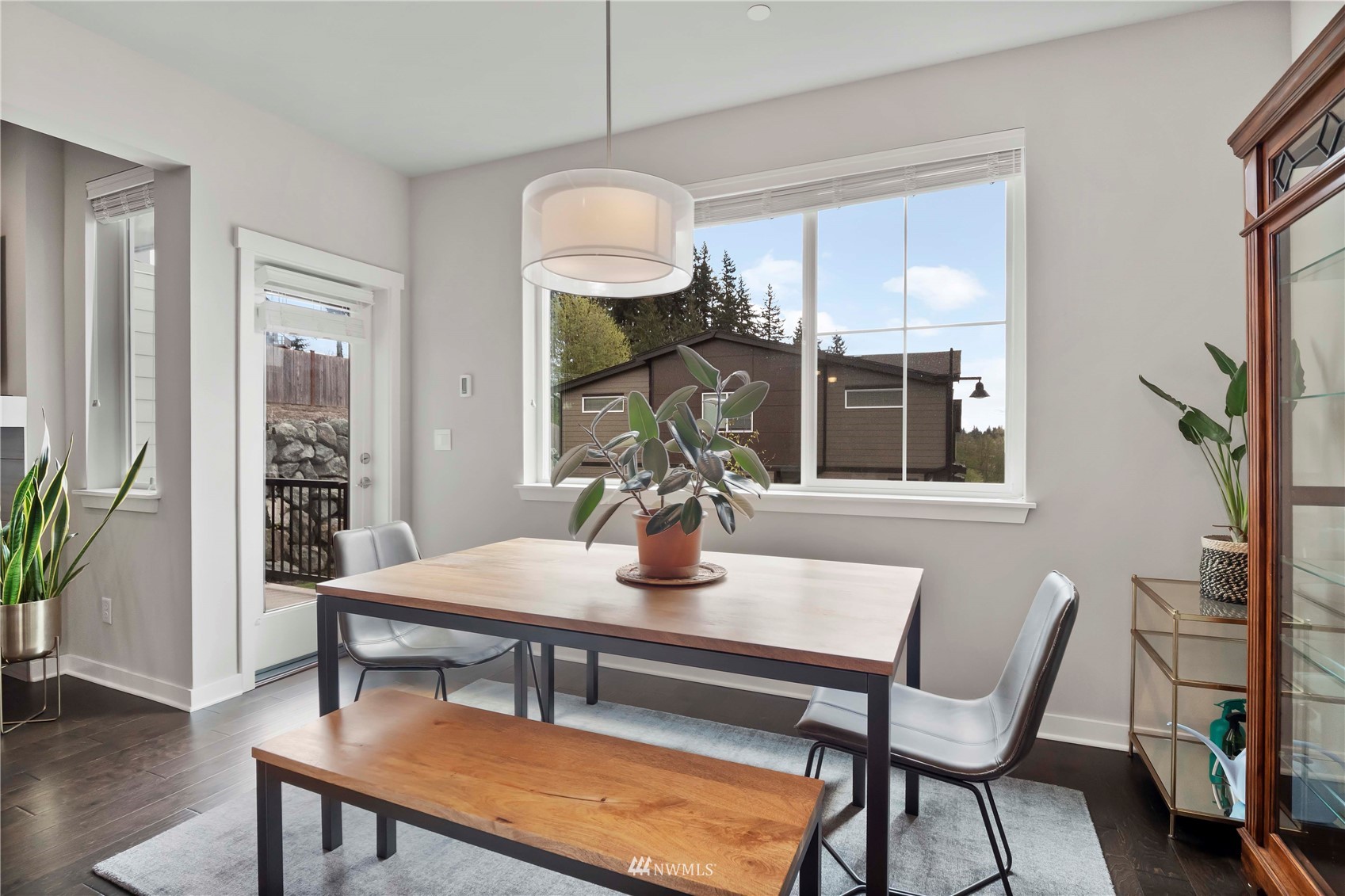 1325 Seattle Hill Road, Unit C4 Bothell, WA 98012 - Photo 8 of 33 a view of a dining room with furniture window and wooden floor
