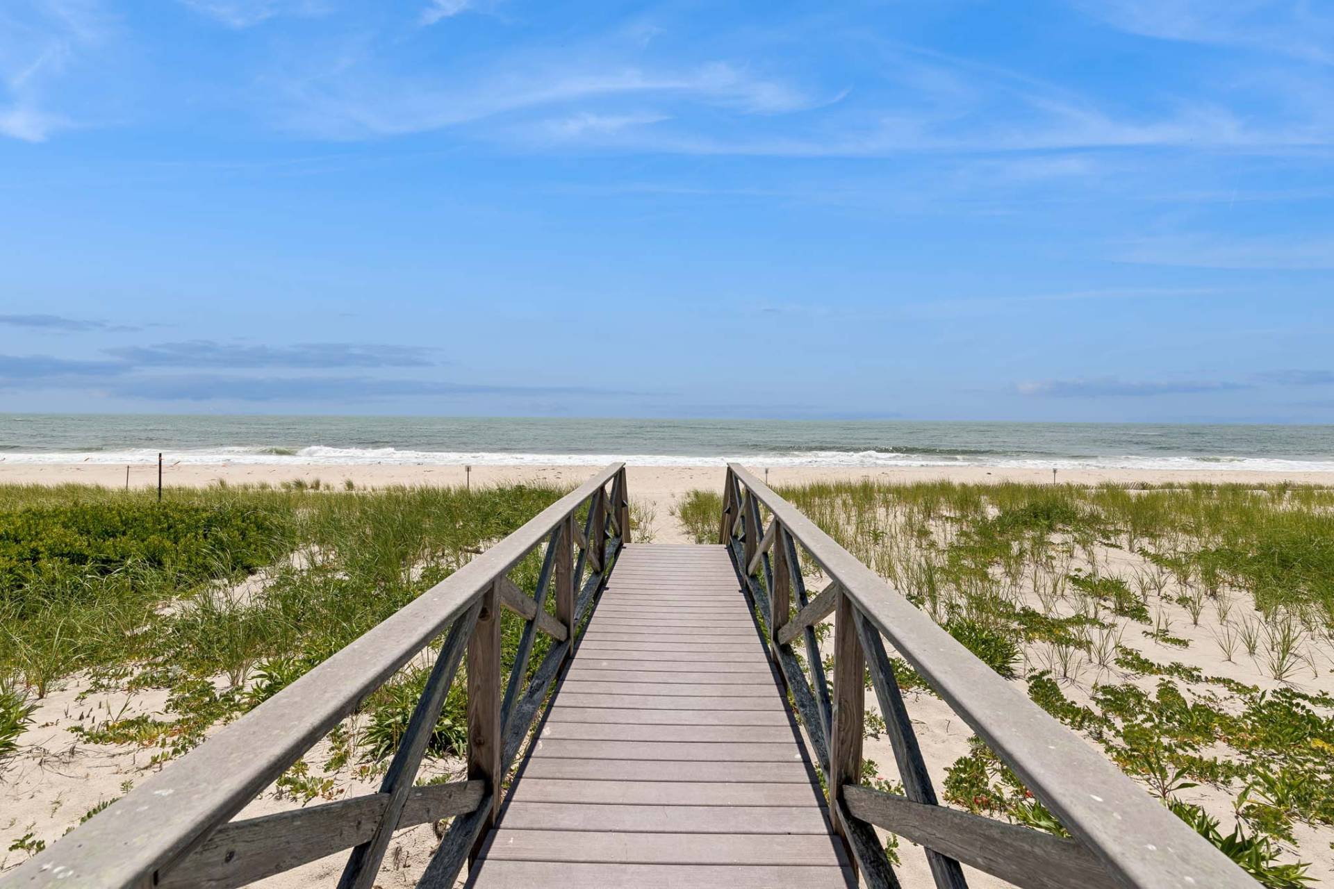 687 Dune Road Westhampton Beach, NY 11978 - Photo 22 of 24 a view of ocean from a balcony