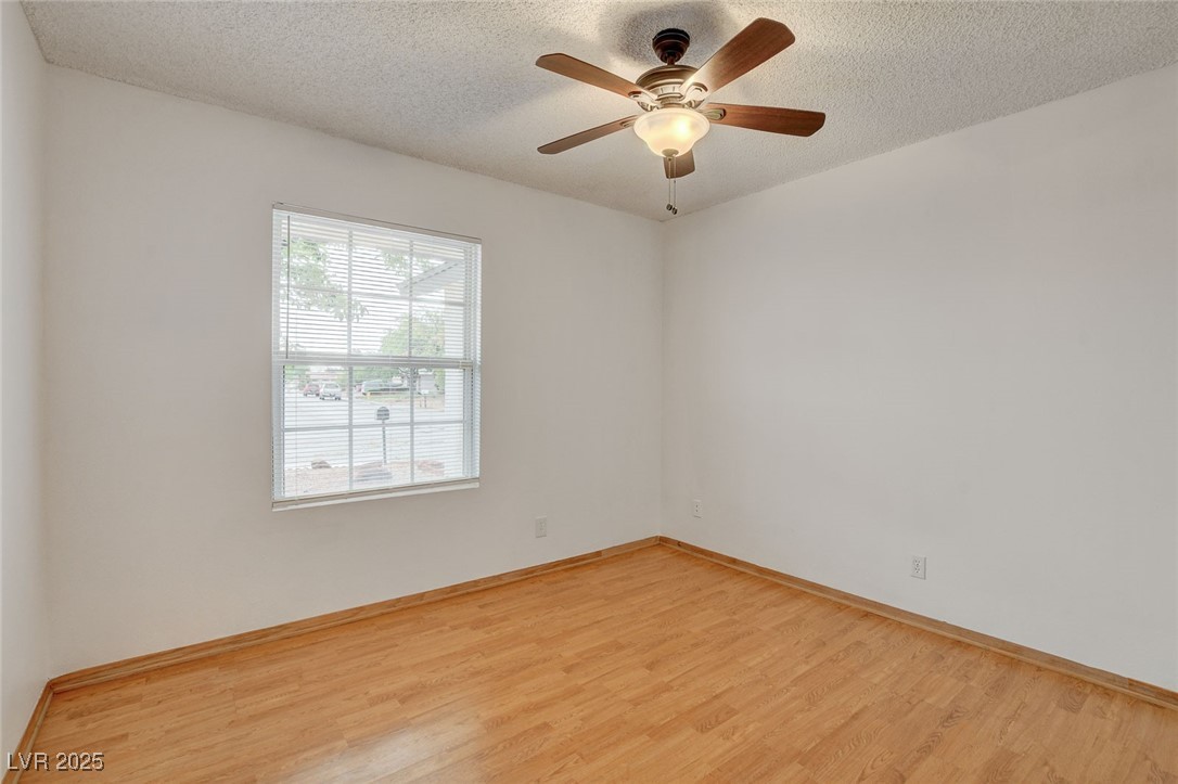4430 Eureka Circle Las Vegas, NV 89103 - Photo 17 of 39 Unfurnished room featuring light wood-style floors