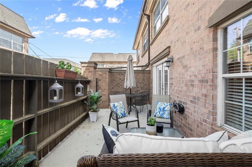 6980 Roswell Road, Unit F7 Atlanta, GA 30328 - Photo 8 of 43 a view of balcony with furniture