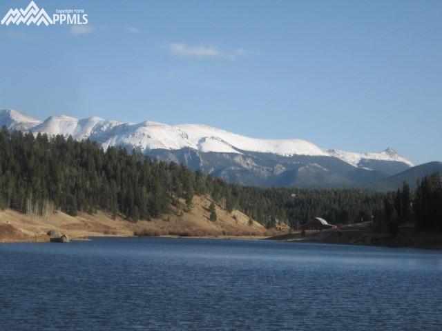 1278 Ridge Road Divide, CO 80814 - Photo 13 of 14 Lake Burgess located in Spring Valley is stocked twice a year and provides ice fishing/fishing/canoeing/kayaking!
(picture is not taken from the house!)