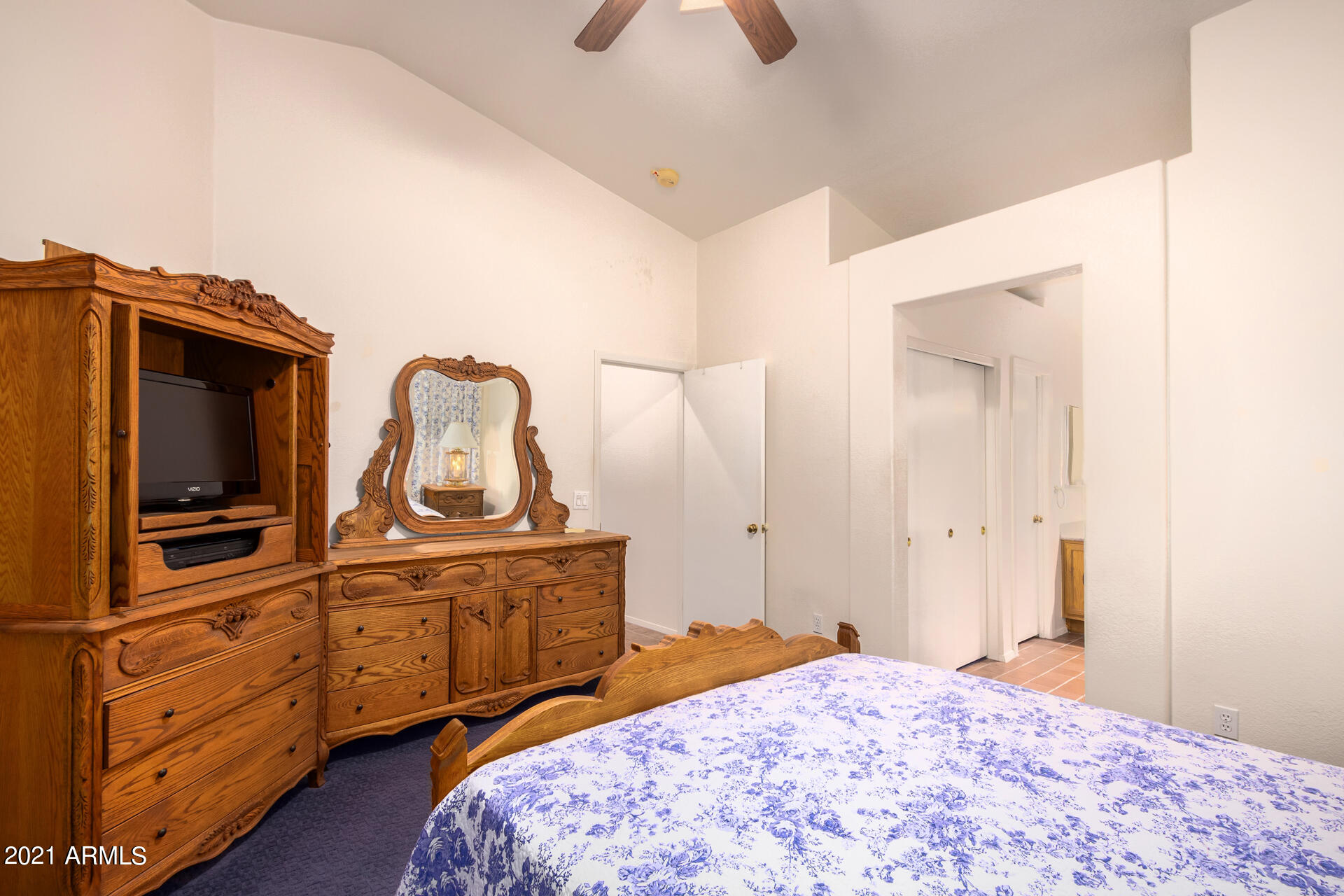 4138 West Bloomfield Road Phoenix, AZ 85029 - Photo 12 of 28 a bedroom with a bed and dresser