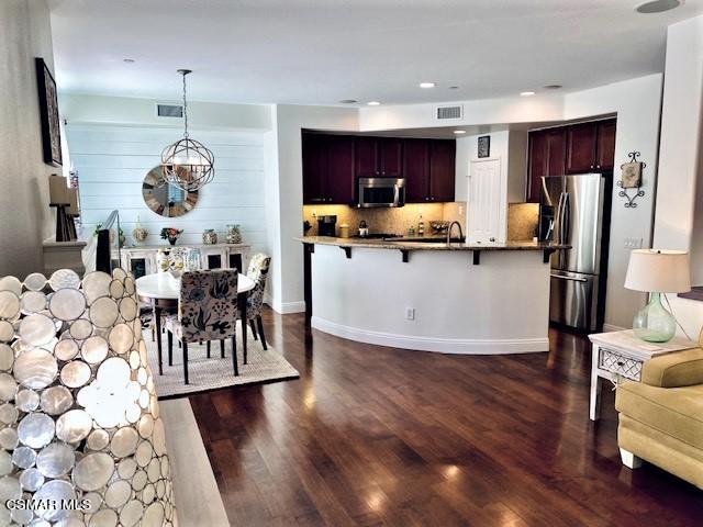 4120 Paredo Way, Unit E Simi Valley, CA 93063 - Photo 3 of 14 Paredo kitchen-eating area