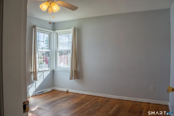 an empty room with window