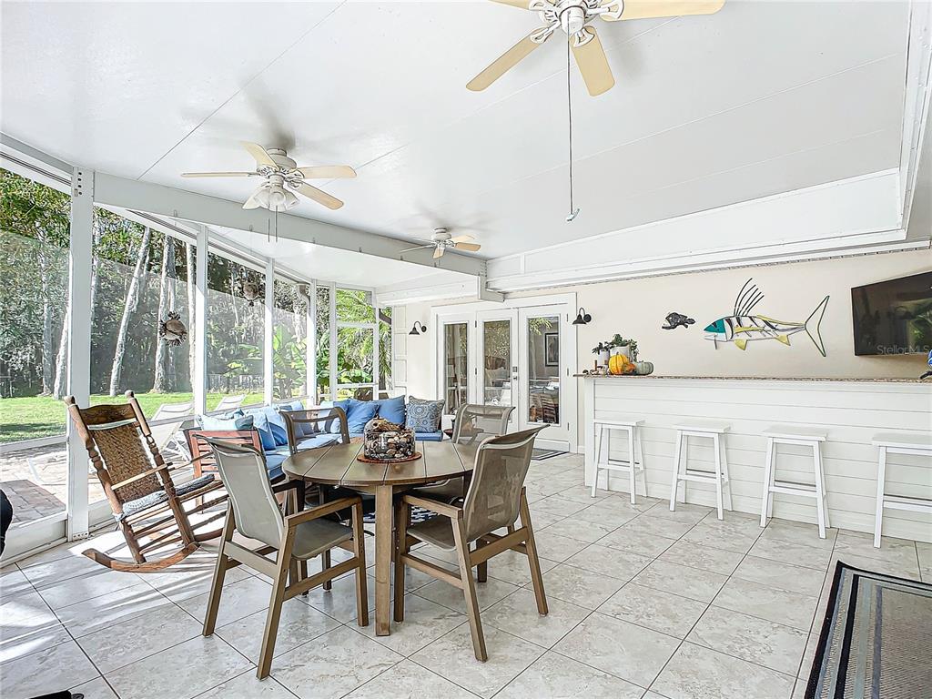 544 Stone Island Road Deltona, FL 32725 - Photo 32 of 66 Lanai with bar
