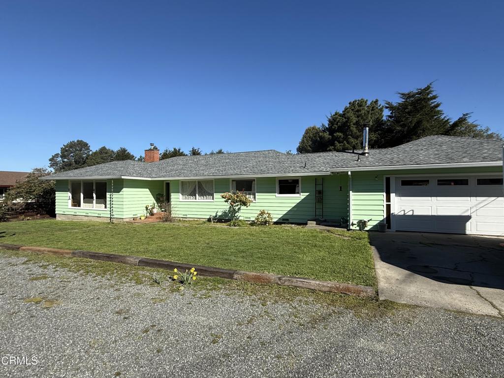 31400 Sherwood Road Fort Bragg, CA 95437 - Photo 7 of 55 a front view of a house with garden