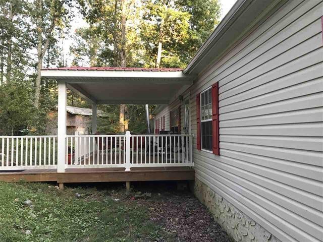 1364 Big Rdg Road Spring City, TN 37381 - Photo 5 of 36 a view of a porch with a bench