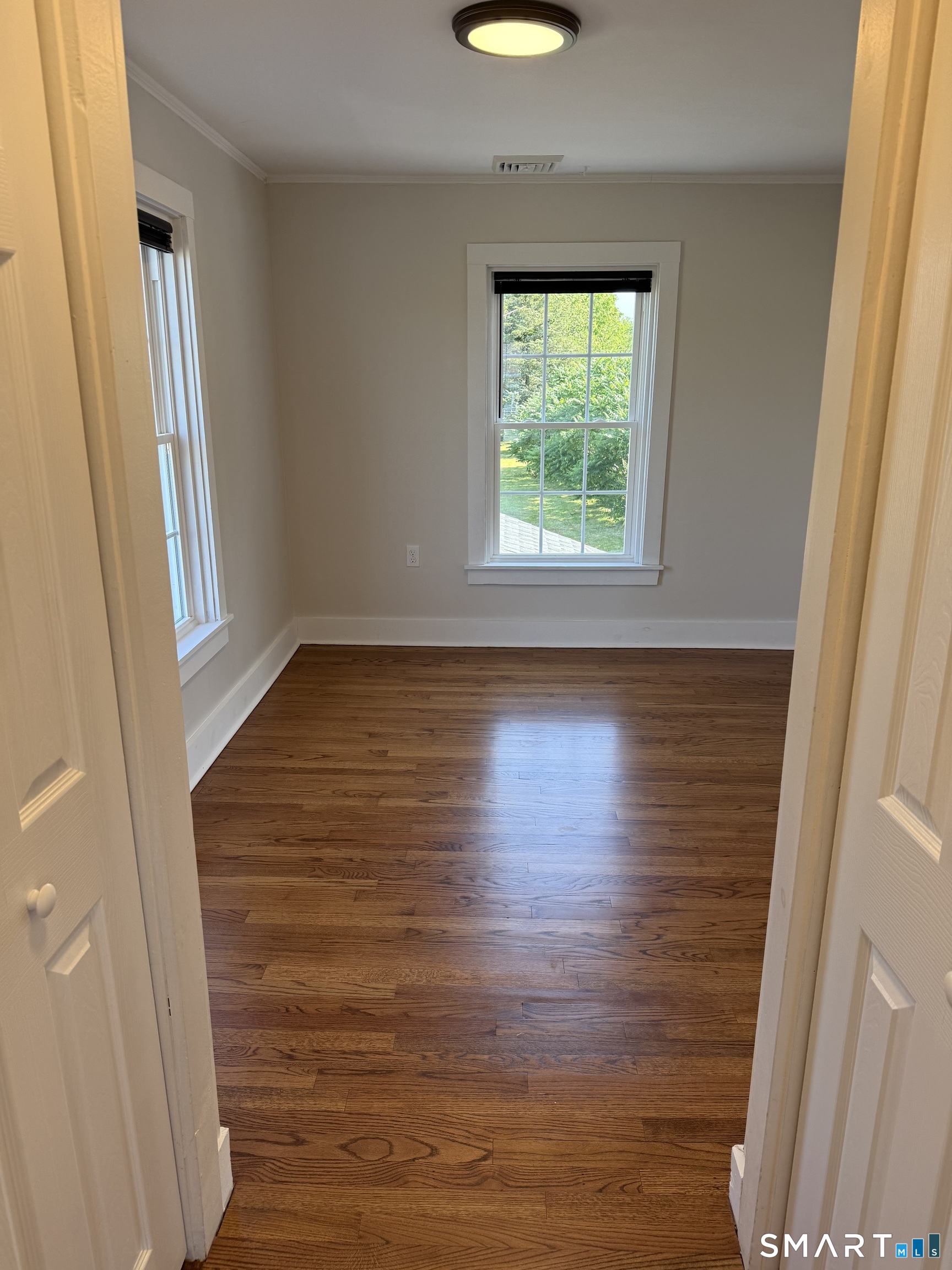 43 Boston Post Road Madison, CT 06443 - Photo 13 of 18 Looking into the living room from the kitchen