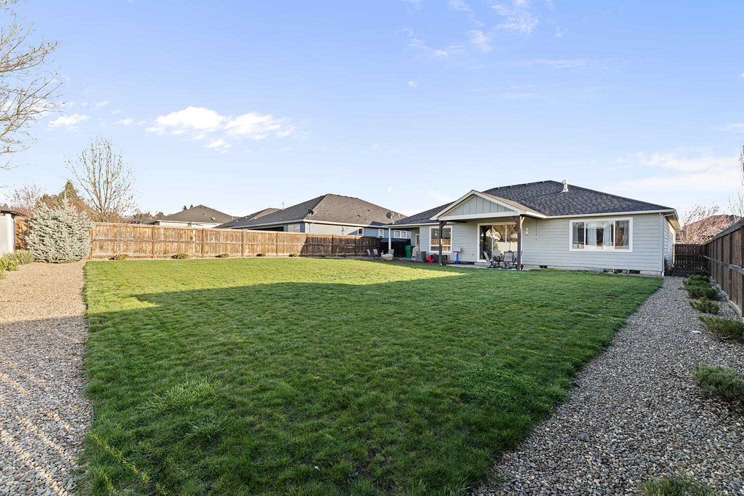 1043 Arrowhead Trail Eagle Point, OR 97524 - Photo 28 of 29 a front view of a house with garden