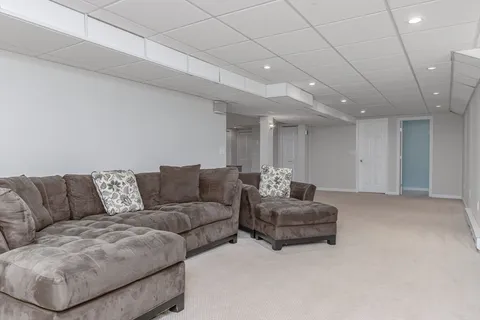 a room with furniture and a flat screen tv