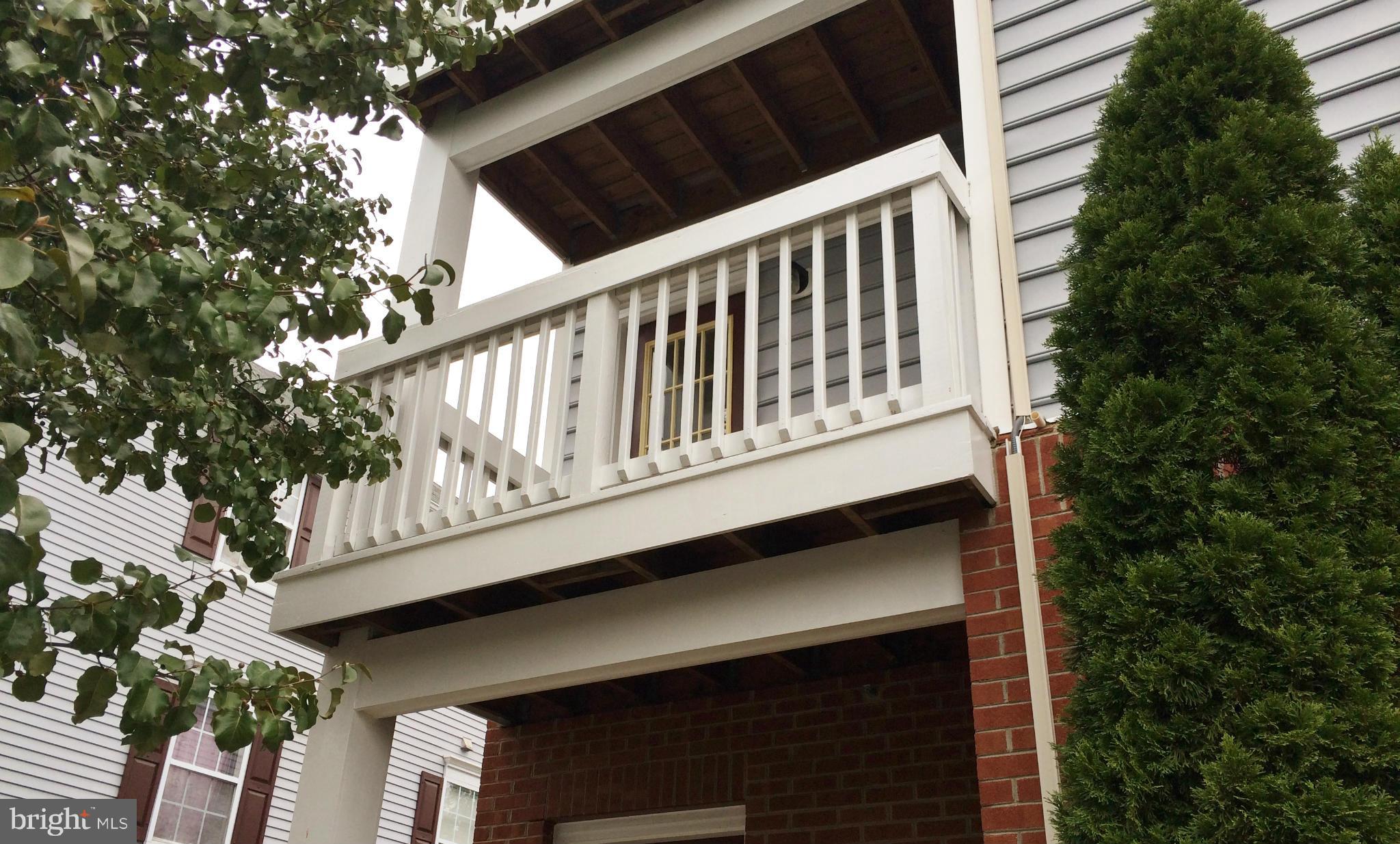 635 Constellation Square Southeast, Unit E Leesburg, VA 20175 - Photo 3 of 20 a balcony view with an outdoor space