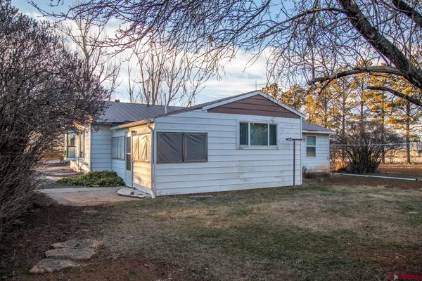 a view of a house with a trees