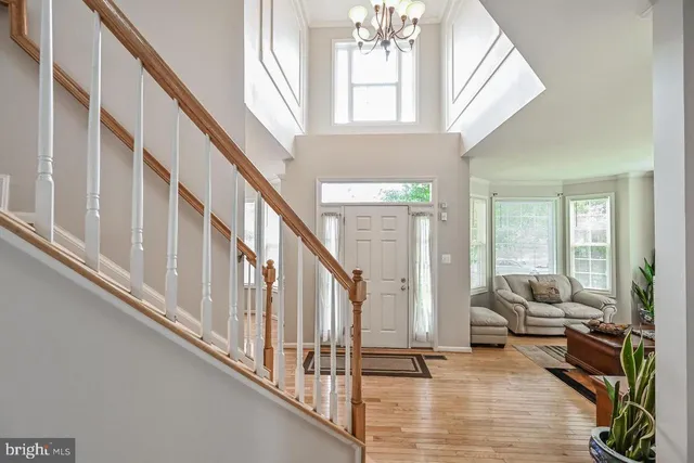 a view of livingroom with furniture and stairs