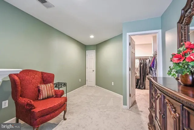 a workspace with furniture and a potted plant
