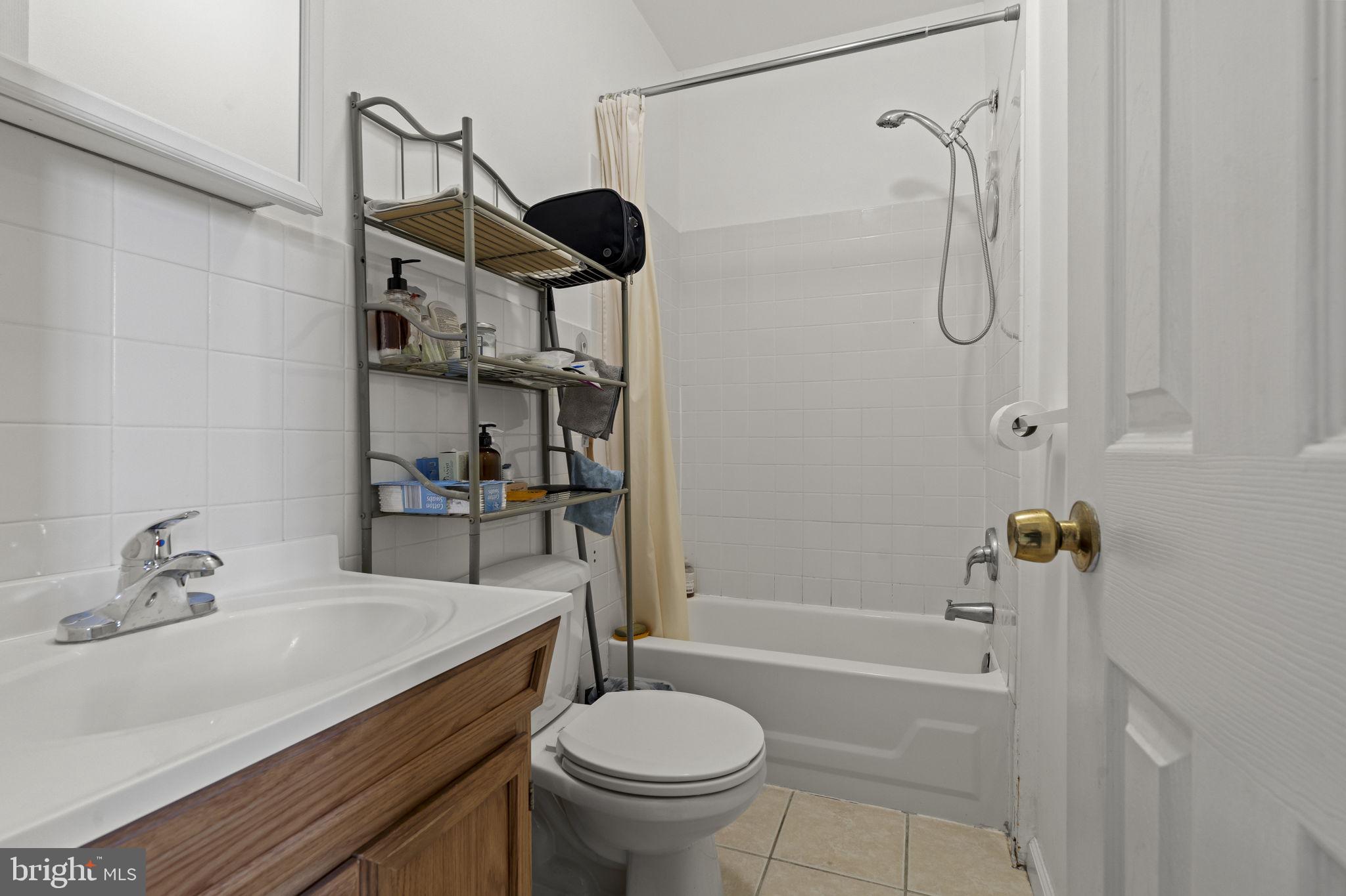 2626 East Allegheny Avenue Philadelphia, PA 19134 - Photo 24 of 32 a bathroom with a sink toilet and shower
