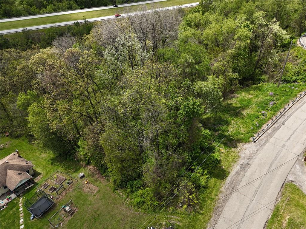 208 Briar Hill Road Kittanning, PA 16201 - Photo 7 of 9 a view of a yard with wooden fence
