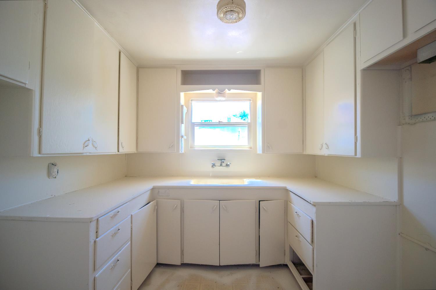 214 Ferguson Avenue Modesto, CA 95354 - Photo 7 of 14 a utility room with cabinets washer and dryer