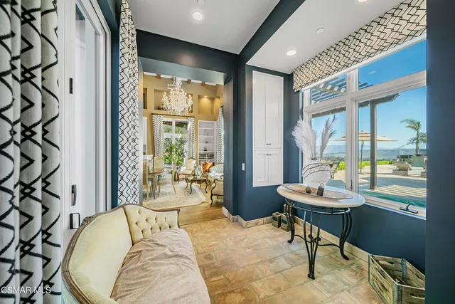 a spacious bathroom with a double vanity sink and mirror