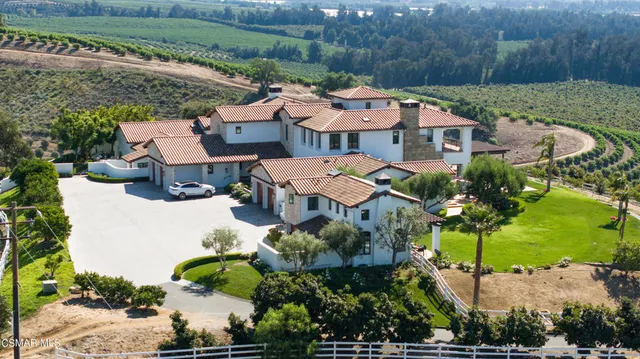 a view of a lake with a yard