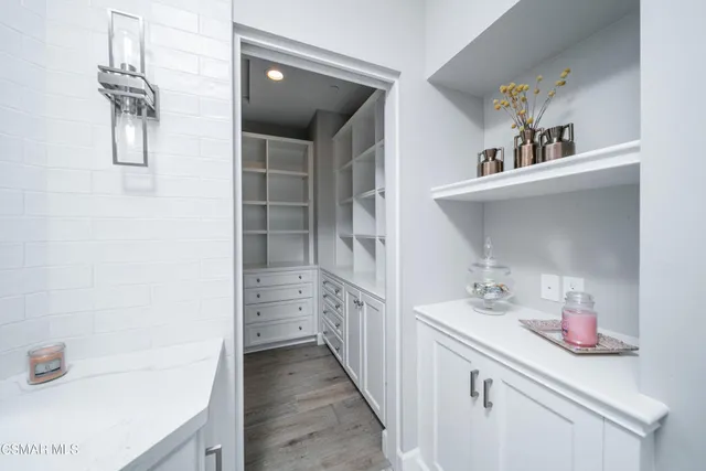 an aerial view of residential houses with outdoor space and river