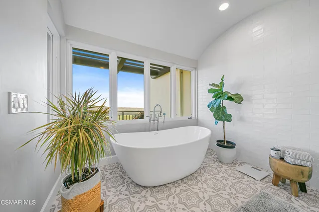 an aerial view of houses with outdoor space