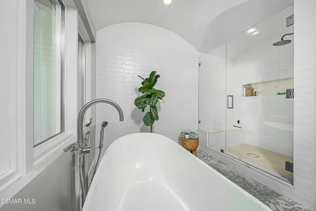 a swimming pool with outdoor seating and yard